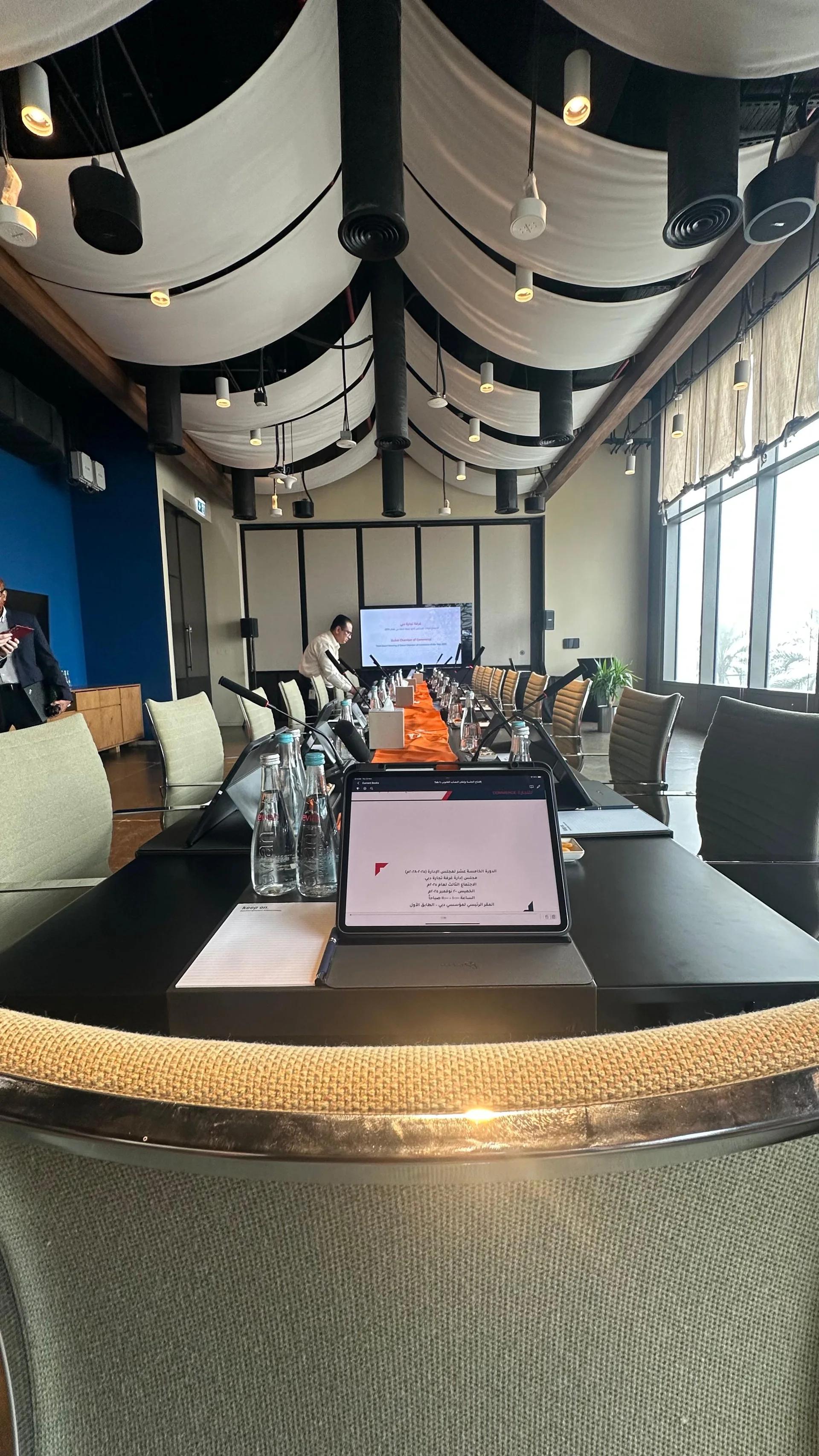 Technology-supported boardroom setup, illustrating structured regional conference production